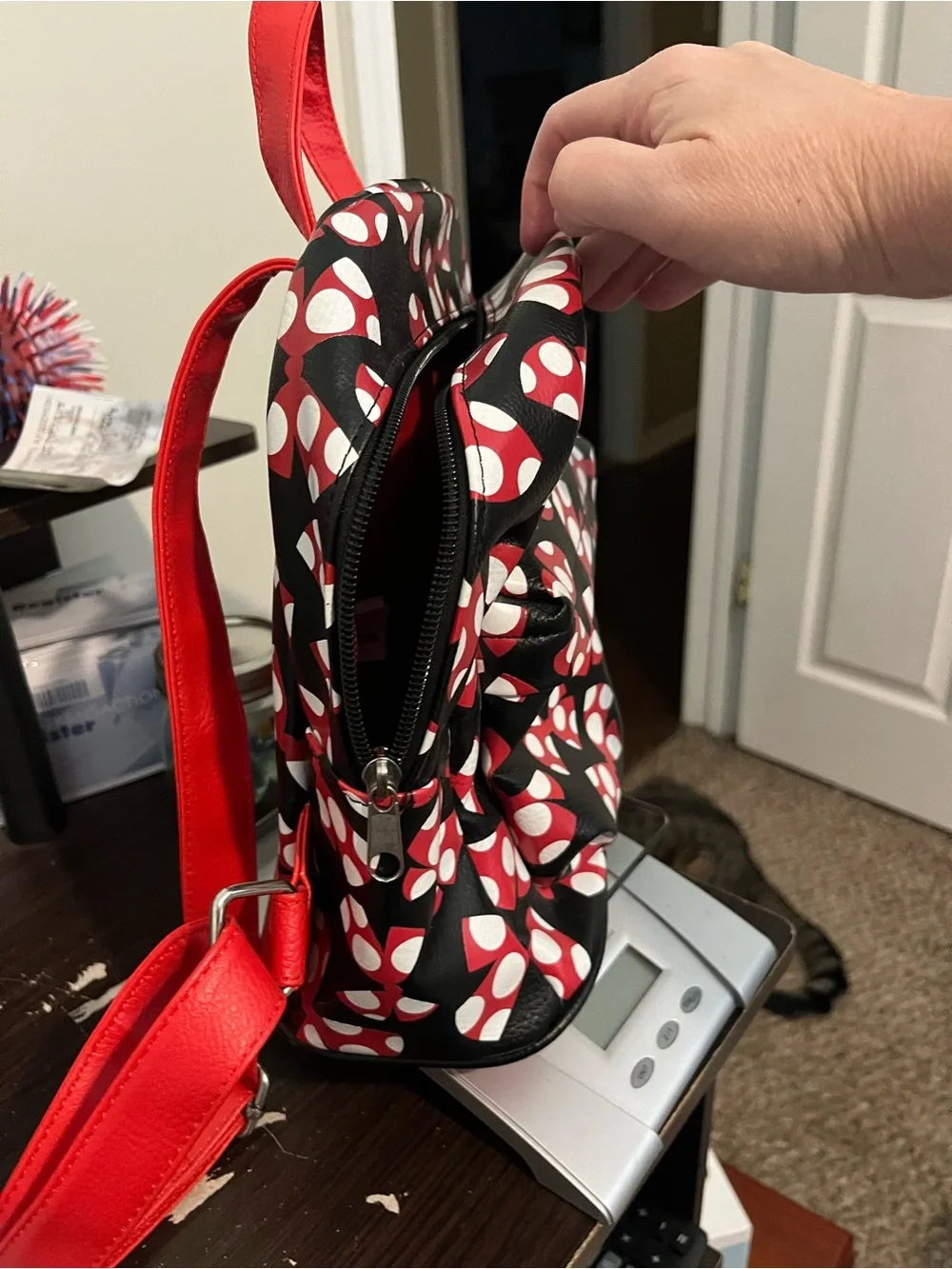 Disney Black Backpack with Red and White Bow Print